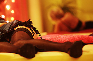 In a brothel in Offenbach, in western Germany, a prostitute waits for clients In a brothel in Offenbach, in western Germany, a prostitute waits for clients